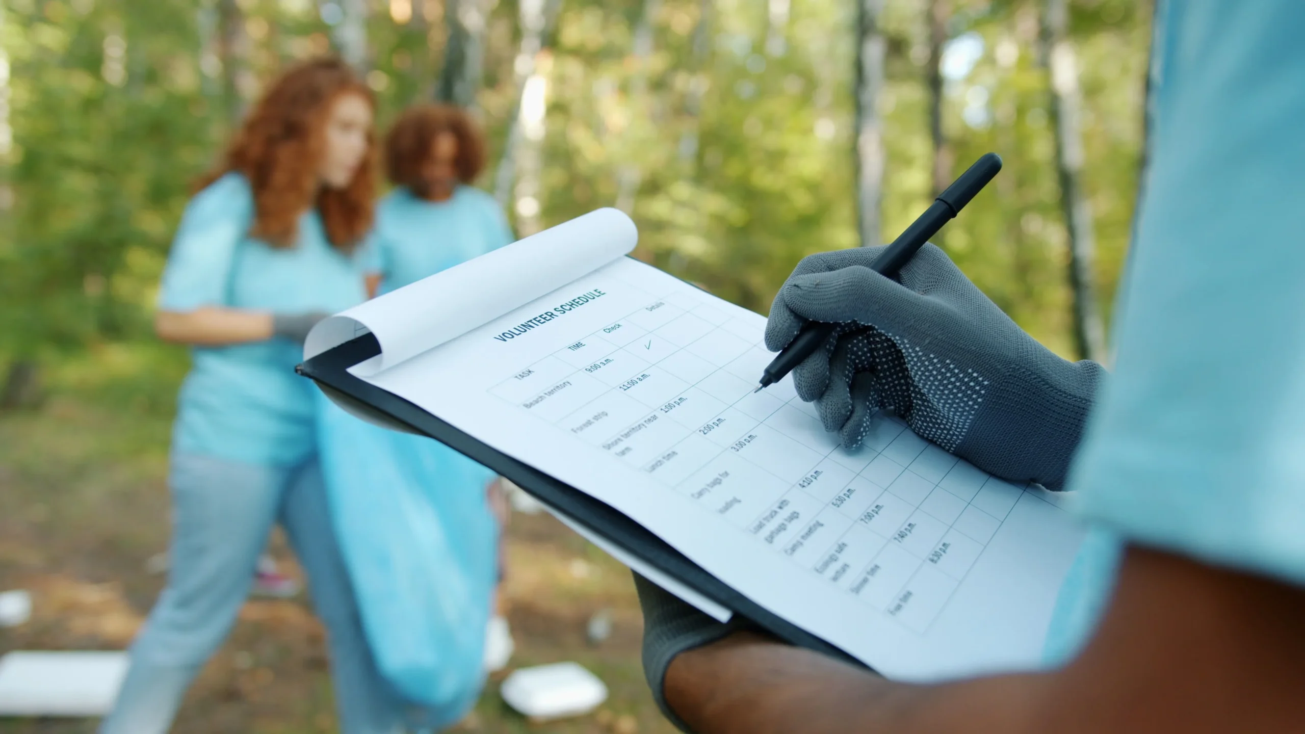 Picture of a person holding a clipboard with a house cleaning service checklist